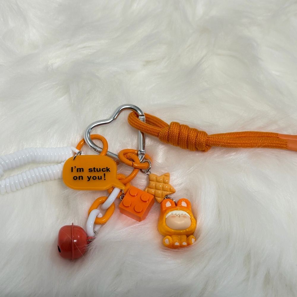 Orange and White Keychain with Charms